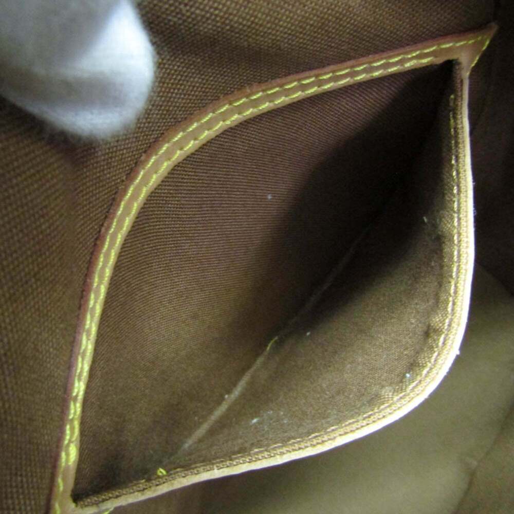 LOUIS VUITTON Brown Monogram Backpack - Picture 14 of 16